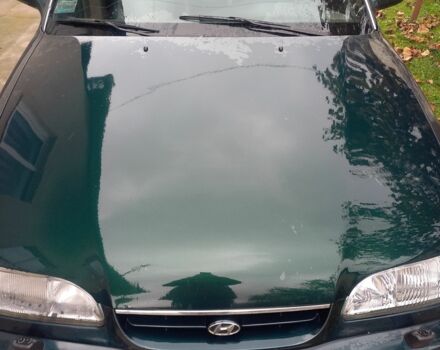 Зеленый Хендай Соната, объемом двигателя 2 л и пробегом 308 тыс. км за 1800 $, фото 5 на Automoto.ua