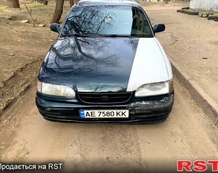Зеленый Хендай Соната, объемом двигателя 2 л и пробегом 350 тыс. км за 2160 $, фото 1 на Automoto.ua