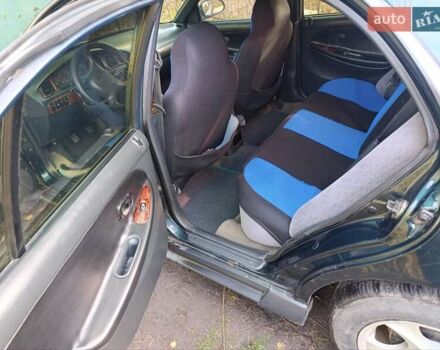 Зеленый Хендай Соната, объемом двигателя 2 л и пробегом 312 тыс. км за 1800 $, фото 5 на Automoto.ua