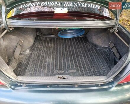 Зеленый Хендай Соната, объемом двигателя 2 л и пробегом 312 тыс. км за 1800 $, фото 6 на Automoto.ua