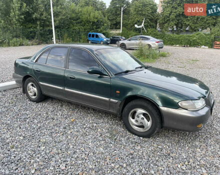 Зеленый Хендай Соната, объемом двигателя 2 л и пробегом 291 тыс. км за 1550 $, фото 3 на Automoto.ua