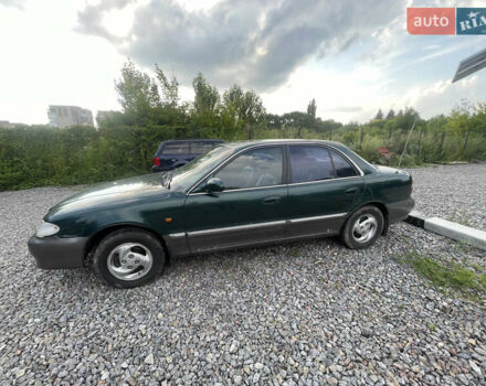 Зеленый Хендай Соната, объемом двигателя 2 л и пробегом 291 тыс. км за 1550 $, фото 5 на Automoto.ua