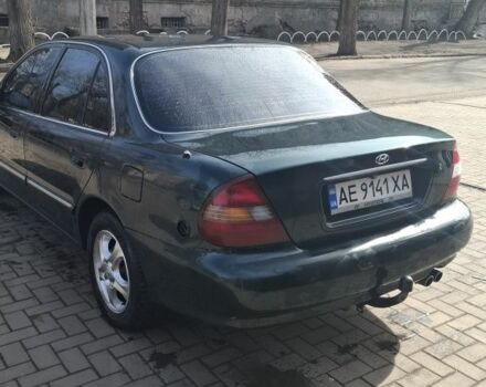 Зеленый Хендай Соната, объемом двигателя 2 л и пробегом 280 тыс. км за 2700 $, фото 4 на Automoto.ua