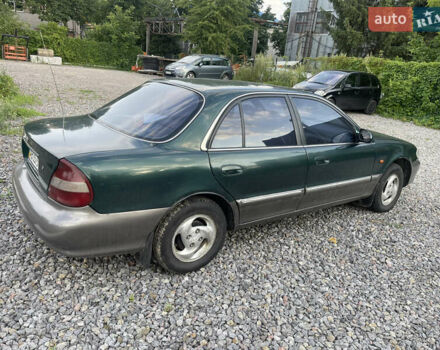 Зеленый Хендай Соната, объемом двигателя 2 л и пробегом 291 тыс. км за 1550 $, фото 4 на Automoto.ua