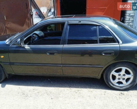 Зеленый Хендай Соната, объемом двигателя 2 л и пробегом 225 тыс. км за 2600 $, фото 5 на Automoto.ua