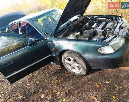 Зеленый Хендай Соната, объемом двигателя 2 л и пробегом 312 тыс. км за 1800 $, фото 9 на Automoto.ua