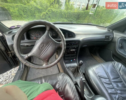 Зеленый Хендай Соната, объемом двигателя 2 л и пробегом 291 тыс. км за 1550 $, фото 10 на Automoto.ua