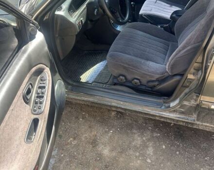 Зелений Хендай Соната, об'ємом двигуна 2 л та пробігом 500 тис. км за 750 $, фото 4 на Automoto.ua