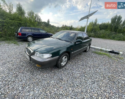 Зеленый Хендай Соната, объемом двигателя 2 л и пробегом 291 тыс. км за 1550 $, фото 2 на Automoto.ua