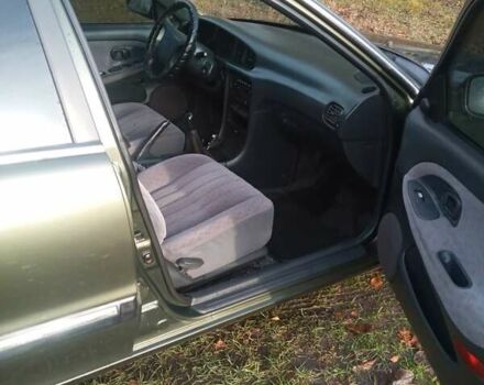 Зелений Хендай Соната, об'ємом двигуна 2 л та пробігом 506 тис. км за 3000 $, фото 6 на Automoto.ua