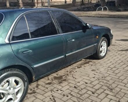 Зеленый Хендай Соната, объемом двигателя 2 л и пробегом 280 тыс. км за 2700 $, фото 1 на Automoto.ua