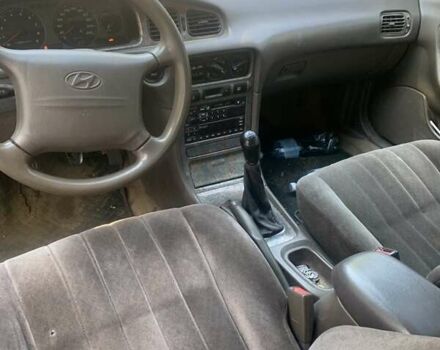 Зеленый Хендай Соната, объемом двигателя 2 л и пробегом 205 тыс. км за 1200 $, фото 6 на Automoto.ua