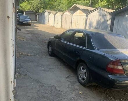 Зеленый Хендай Соната, объемом двигателя 2 л и пробегом 205 тыс. км за 1200 $, фото 1 на Automoto.ua