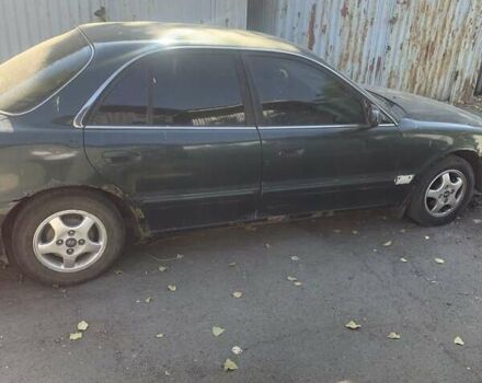 Зеленый Хендай Соната, объемом двигателя 2 л и пробегом 205 тыс. км за 1200 $, фото 3 на Automoto.ua