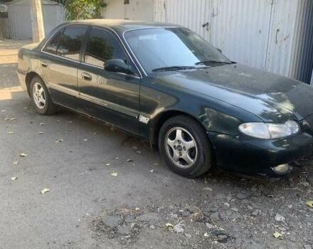 Зеленый Хендай Соната, объемом двигателя 2 л и пробегом 205 тыс. км за 1200 $, фото 5 на Automoto.ua