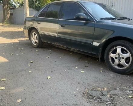 Зеленый Хендай Соната, объемом двигателя 2 л и пробегом 205 тыс. км за 1200 $, фото 4 на Automoto.ua