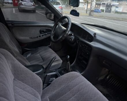 Зеленый Хендай Соната, объемом двигателя 2 л и пробегом 478 тыс. км за 1800 $, фото 5 на Automoto.ua