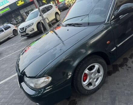 Зеленый Хендай Соната, объемом двигателя 2 л и пробегом 478 тыс. км за 1800 $, фото 4 на Automoto.ua