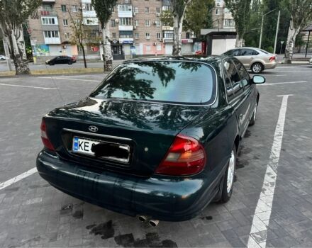 Зеленый Хендай Соната, объемом двигателя 2 л и пробегом 478 тыс. км за 1800 $, фото 1 на Automoto.ua