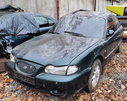 Зеленый Хендай Соната, объемом двигателя 2 л и пробегом 235 тыс. км за 1300 $, фото 2 на Automoto.ua