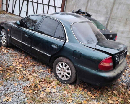 Зеленый Хендай Соната, объемом двигателя 2 л и пробегом 235 тыс. км за 1300 $, фото 4 на Automoto.ua