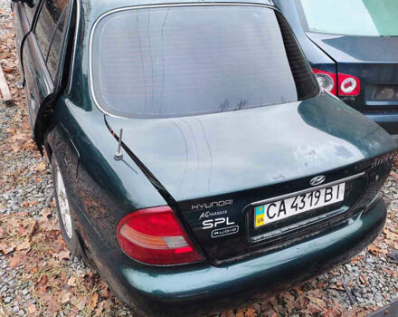 Зеленый Хендай Соната, объемом двигателя 2 л и пробегом 235 тыс. км за 1300 $, фото 1 на Automoto.ua