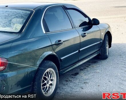 Зеленый Хендай Соната, объемом двигателя 2 л и пробегом 250 тыс. км за 3500 $, фото 5 на Automoto.ua