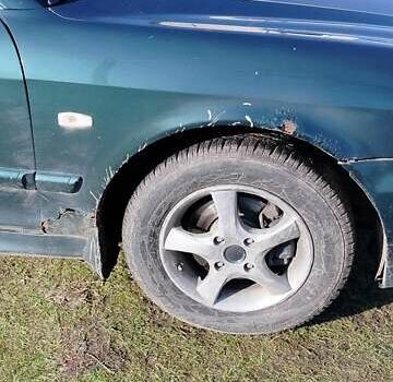 Зеленый Хендай Соната, объемом двигателя 2 л и пробегом 257 тыс. км за 3000 $, фото 2 на Automoto.ua