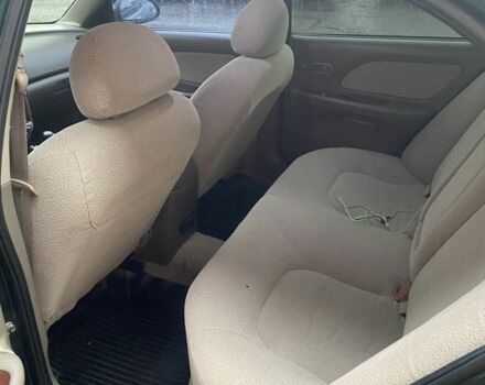 Зеленый Хендай Соната, объемом двигателя 2 л и пробегом 201 тыс. км за 2850 $, фото 11 на Automoto.ua