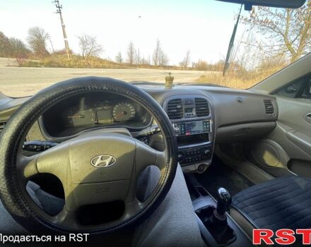 Зеленый Хендай Соната, объемом двигателя 2 л и пробегом 250 тыс. км за 3500 $, фото 6 на Automoto.ua