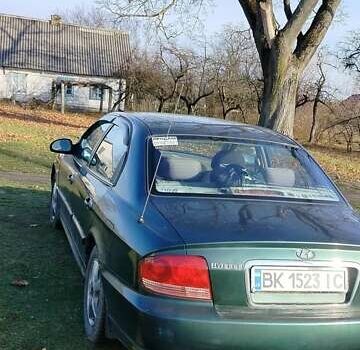 Зеленый Хендай Соната, объемом двигателя 2 л и пробегом 257 тыс. км за 3000 $, фото 3 на Automoto.ua