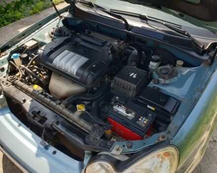 Зеленый Хендай Соната, объемом двигателя 2 л и пробегом 245 тыс. км за 3100 $, фото 12 на Automoto.ua