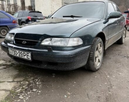 Зеленый Хендай Соната, объемом двигателя 2 л и пробегом 310 тыс. км за 1600 $, фото 1 на Automoto.ua