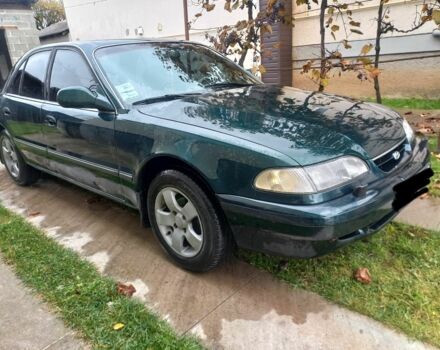 Зеленый Хендай Соната, объемом двигателя 2 л и пробегом 308 тыс. км за 1800 $, фото 1 на Automoto.ua