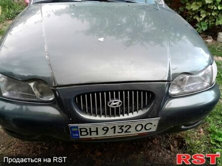 Зеленый Хендай Соната, объемом двигателя 2 л и пробегом 376 тыс. км за 2100 $, фото 1 на Automoto.ua