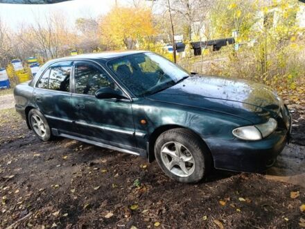 Зеленый Хендай Соната, объемом двигателя 2 л и пробегом 311 тыс. км за 1903 $, фото 1 на Automoto.ua