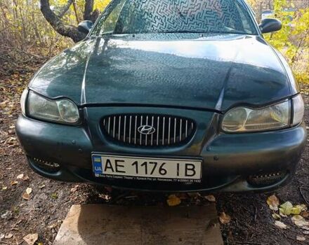 Зеленый Хендай Соната, объемом двигателя 2 л и пробегом 312 тыс. км за 1800 $, фото 1 на Automoto.ua