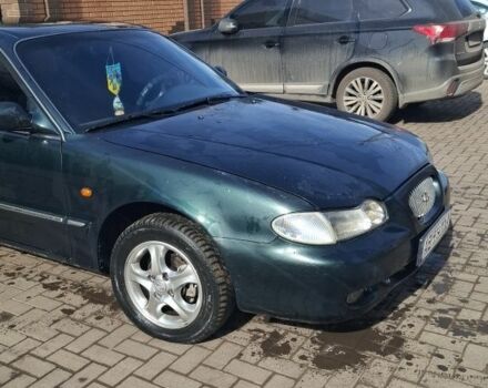 Зеленый Хендай Соната, объемом двигателя 2 л и пробегом 280 тыс. км за 2700 $, фото 1 на Automoto.ua