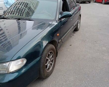 Зеленый Хендай Соната, объемом двигателя 2 л и пробегом 300 тыс. км за 1800 $, фото 1 на Automoto.ua