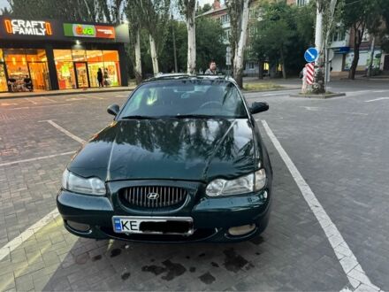 Зеленый Хендай Соната, объемом двигателя 2 л и пробегом 478 тыс. км за 1800 $, фото 1 на Automoto.ua