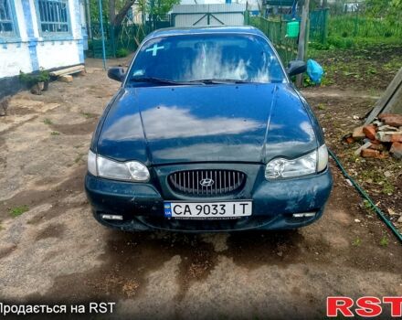 Зеленый Хендай Соната, объемом двигателя 2 л и пробегом 268 тыс. км за 2160 $, фото 1 на Automoto.ua