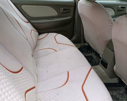Зеленый Хендай Соната, объемом двигателя 2 л и пробегом 300 тыс. км за 1100 $, фото 1 на Automoto.ua