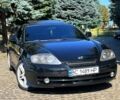 Черный Хендай Тибурон, объемом двигателя 2.7 л и пробегом 195 тыс. км за 4500 $, фото 2 на Automoto.ua
