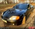 Черный Хендай Тибурон, объемом двигателя 27 л и пробегом 100 тыс. км за 4999 $, фото 5 на Automoto.ua