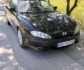 Черный Хендай Тибурон, объемом двигателя 2 л и пробегом 300 тыс. км за 2950 $, фото 1 на Automoto.ua