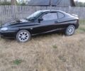 Черный Хендай Тибурон, объемом двигателя 2 л и пробегом 300 тыс. км за 2950 $, фото 3 на Automoto.ua