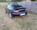 Черный Хендай Тибурон, объемом двигателя 2 л и пробегом 300 тыс. км за 2950 $, фото 4 на Automoto.ua