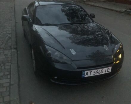 Чорний Хендай Тібурон, об'ємом двигуна 2.7 л та пробігом 300 тис. км за 7000 $, фото 8 на Automoto.ua