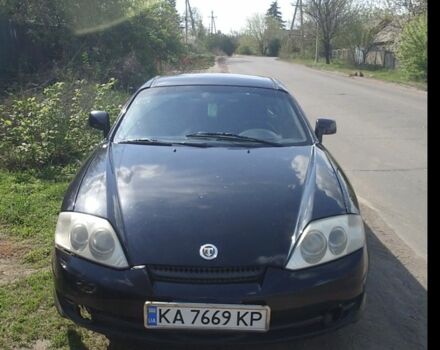 Черный Хендай Тибурон, объемом двигателя 2 л и пробегом 194 тыс. км за 1500 $, фото 1 на Automoto.ua