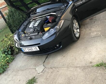 Черный Хендай Тибурон, объемом двигателя 2.7 л и пробегом 300 тыс. км за 7000 $, фото 1 на Automoto.ua